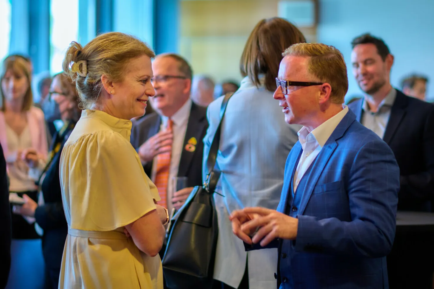 Two people at a UICC event