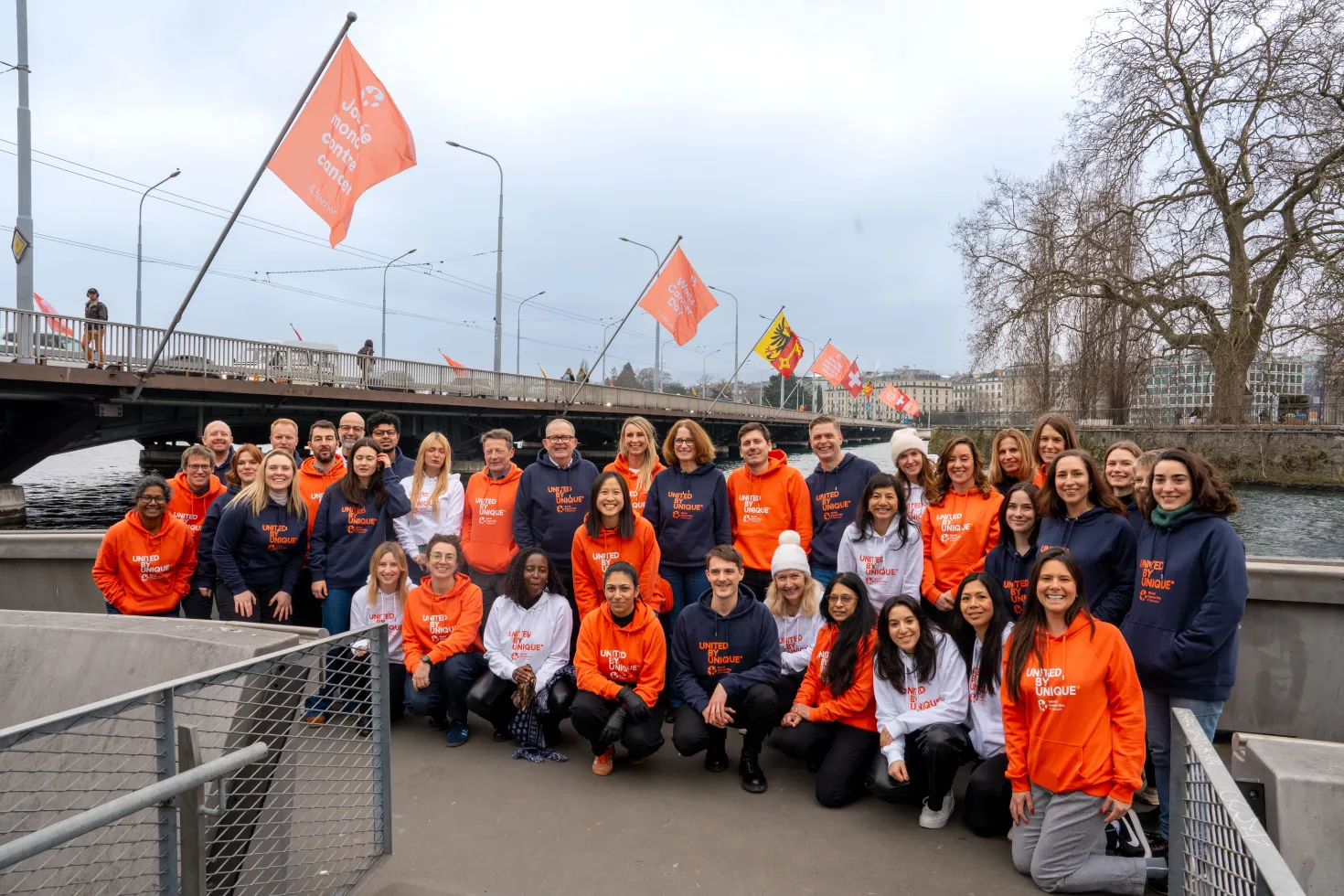 The UICC Team mark World Cancer Day 2025 (4 February) with the World Cancer Day flags on the Mont-Blanc bridge in Geneva, Switzerland. World Cancer Day 2025 - UICC
