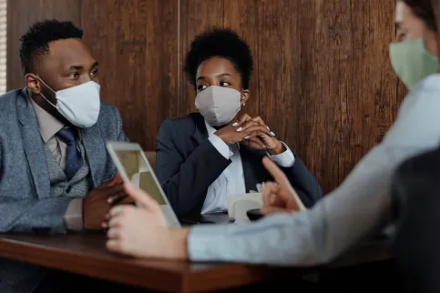 People in business attire talking