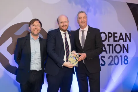 Charles Revkin, Comms & Web Manager, UICC, receives award Charles Revkin, Comms & Web Manager, UICC, receives award
