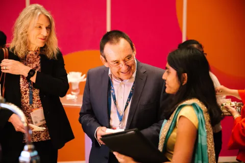 Jeff Dunn speaking with delegates at the 2018 World Cancer Congress Jeff Dunn speaking with delegates at the 2018 World Cancer Congress