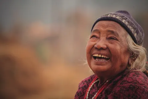Cancer care for adults over 65 is not a niche issue as they represent more than half of all cancer patients. It is not about extending life but responding to their individual needs and providing the care and services they need. Older women looking up and laughing